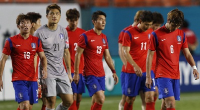 שחקני דרום קוריאה מאוכזבים (רויטרס)