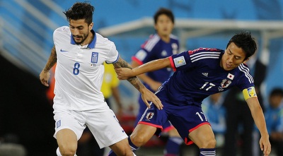 קונה מצליח לחלץ את הכדור (רויטרס)