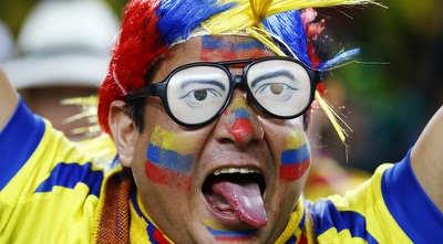 אוהד אקוואדור ססגוני ביציע (רויטרס) אוהד אקוואדור ססגוני ביציע (רויטרס)