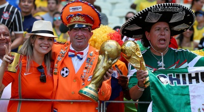 אוהדי נבחרת מקסיקו ואלו של הולנד (GettyImages) אוהדי נבחרת מקסיקו ואלו של הולנד (GettyImages)