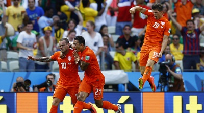 שחקני הולנד חוגגים (רויטרס) שחקני הולנד חוגגים (רויטרס)