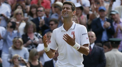 ג´וקוביץ´ חוגג (רויטרס) ג´וקוביץ´ חוגג (רויטרס)