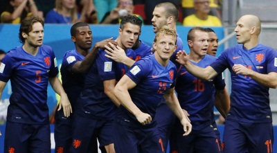 שחקני הולנד חוגגים (רויטרס) שחקני הולנד חוגגים (רויטרס)