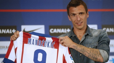 מריו מנדזוקיץ´ מוצג באתלטיקו מדריד (רויטרס) מריו מנדזוקיץ´ מוצג באתלטיקו מדריד (רויטרס)