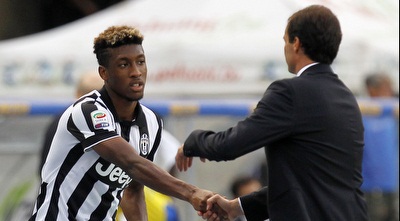 מאסימו אלגרי מברך את קינגסלי קומאן שערך בכורה (רויטרס)