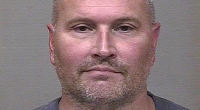 רקס צ´פמאן כפי שצולם בתחנת המשטרה (רויטרס)