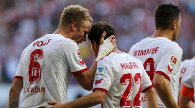 שחקני קלן חוגגים על חשבון דורטמונד (רויטרס)