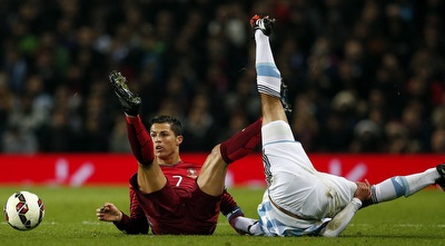 רונאלדו על הדשא (רויטרס) רונאלדו על הדשא (רויטרס)