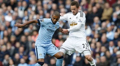 פרננדיניו מול סיגורדסון (רויטרס) פרננדיניו מול סיגורדסון (רויטרס)