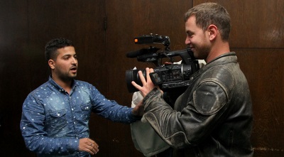 מקורבו של החשוד תוקף צלם (רדאד ג&acute;בארה)