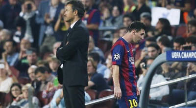 מסי ולואיס אנריקה. המאמן שיבח את הפרעוש