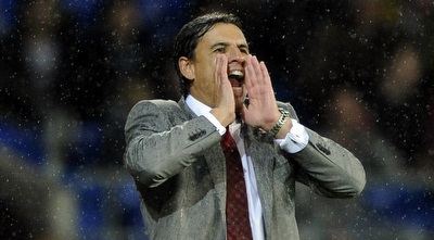 כריס קולמן בגשם (רויטרס) כריס קולמן בגשם (רויטרס)