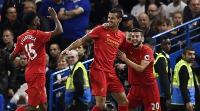 לוברן ושחקני ליברפול חוגגים (רויטרס)