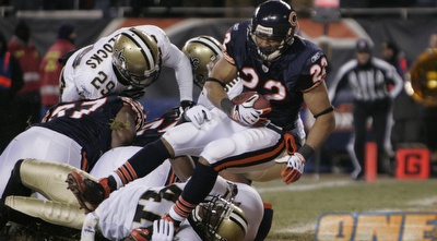 מאט פורטה בדרך לטאצ'דאון. שיקאגו בדרך לפלייאוף (רויטרס)