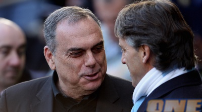 גרנט ומנצ&acute;יני בשיחה צפופה. היום במנצ&acute;סטר (GettyImages)