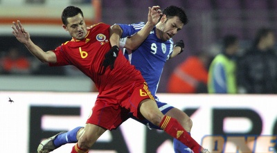 רוברטו קולאוטי נאבק במירל ראדוי, הערב (רויטרס)