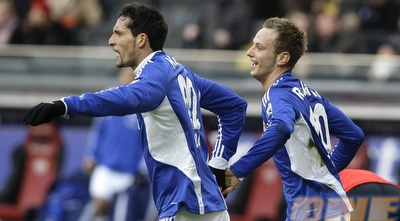 קוראני ורקיטיץ´ חוגגים. שאלקה מאיימת על האליפות (רויטרס)