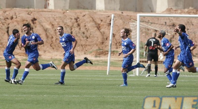 שחקני אשקלון חוגגים את השער של דג´אני (דרור עינב)