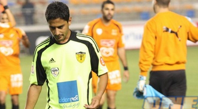 יצחקי מאוכזב. &qout;הייתי ממליץ לו להתעלם ולרדת לחדר ההלבשה&qout; (גיא בן זיו)