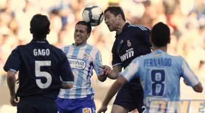 צ´אבי אלונסו מתקשה מול מלאגה. ריאל לא תזכה באליפות (רויטרס) צ´אבי אלונסו מתקשה מול מלאגה. ריאל לא תזכה באליפות (רויטרס)