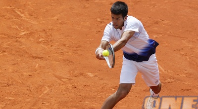 נובאק ג´וקוביץ´. עוד ניצחוון, הפעם ללא לשחק (רויטרס)