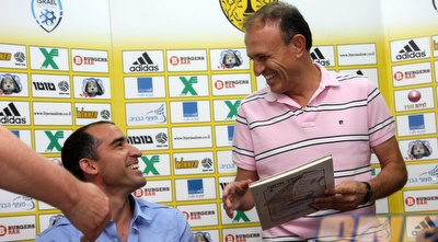 קורנפיין ומלמיליאן מחליפים חיוכים במסע&qout;ת (דרור עינב) קורנפיין ומלמיליאן מחליפים חיוכים במסע&qout;ת (דרור עינב)