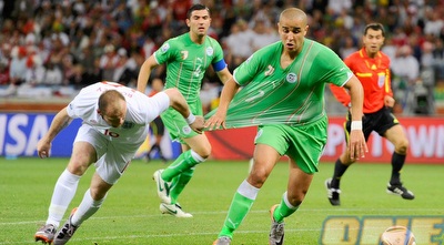 וויין רוני תופס את מאג´יד בוגרה (רויטרס)