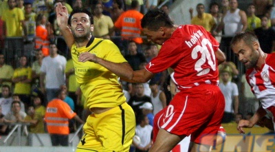 קולאוטי מתרומם לכדור גובה מול אולבאס (יניב גונן)