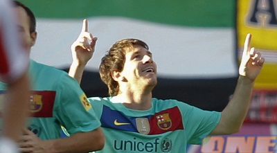 מסי חוגג את השער הראשון במשחק (רויטרס)