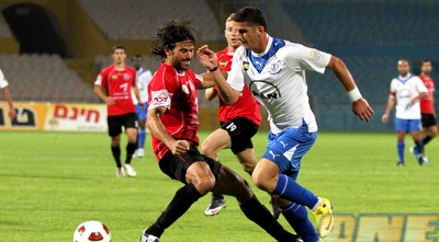 דודו ביטון עובר את גולן חרמון (שי לוי)