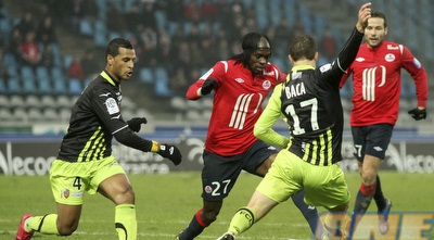 ג´רביניו מלהטט מול לוריין (רויטרס)