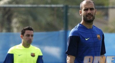 גוארדיולה וצ´אבי (רויטרס)