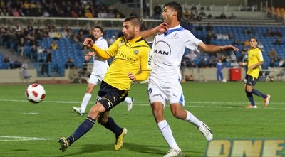 אלירן עטר. הוא ובוזגלו ינצלו את הטעויות של האדומים (שי לוי)