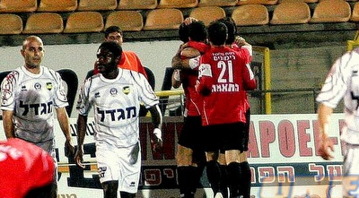 שחקני הפועל חיפה חוגגים, הנתנייתים מאוכזבים (יניב גונן)