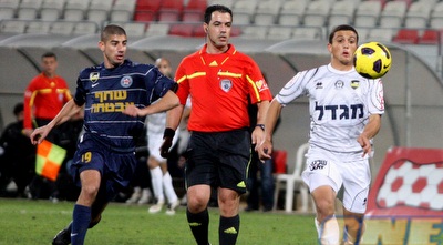 בן בנימין רודף אחרי פיראס מוגרבי (יניב גונן)