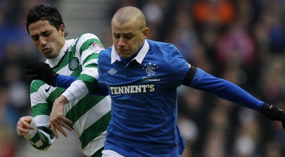 בירם כיאל מול לדימיר וייס. הקשר עבר לאולימפאיקוס (GettyImages)