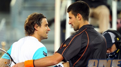 נובאק ג&acute;וקוביץ&acute; ודוד פרר נפרדים בסיום המשחק (GettyImages)