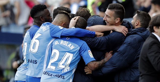 שחקני מלאגה חוגגים את השער (La Liga)
