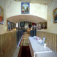 Biserica - Izbita, Bucium