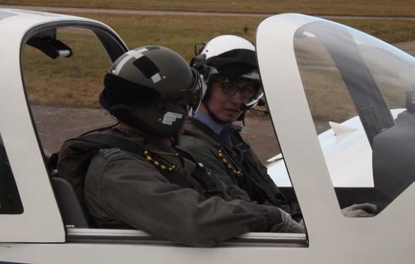 Connor In The Aircraft Chatting With The Pilot Small
