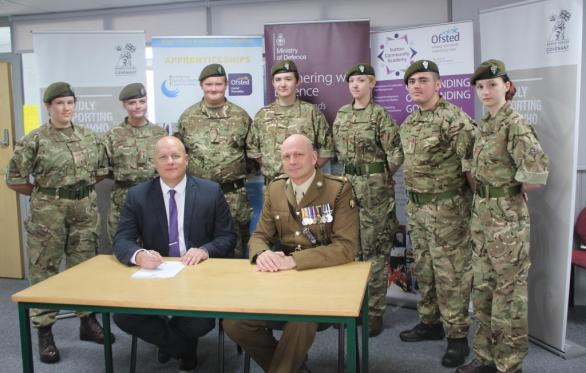 Principal Tim Croft And Lt Col Keith Spiers With Cadets From The Schools Cadet Unit
