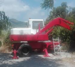 Escavatore gommato Poclain 60 - Lotto 5 (Asta 3575)