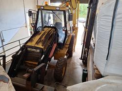 Caterpillar backhoe loader and Hitachi mini excavator - Lot 0 (Auction 9666)
