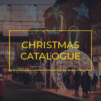 Walk-though Bauble and programmable cross street Christmas motifs on busy shopping street