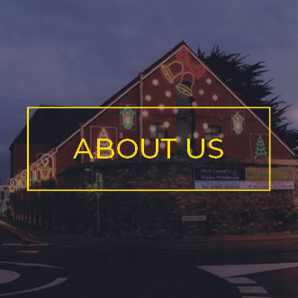 Historical photo of the company’s previous headquarters with Christmas motifs on the building façade