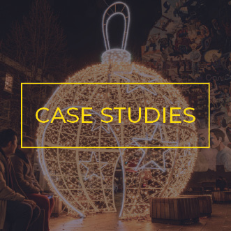 Large walkthrough bauble with stars in city street square