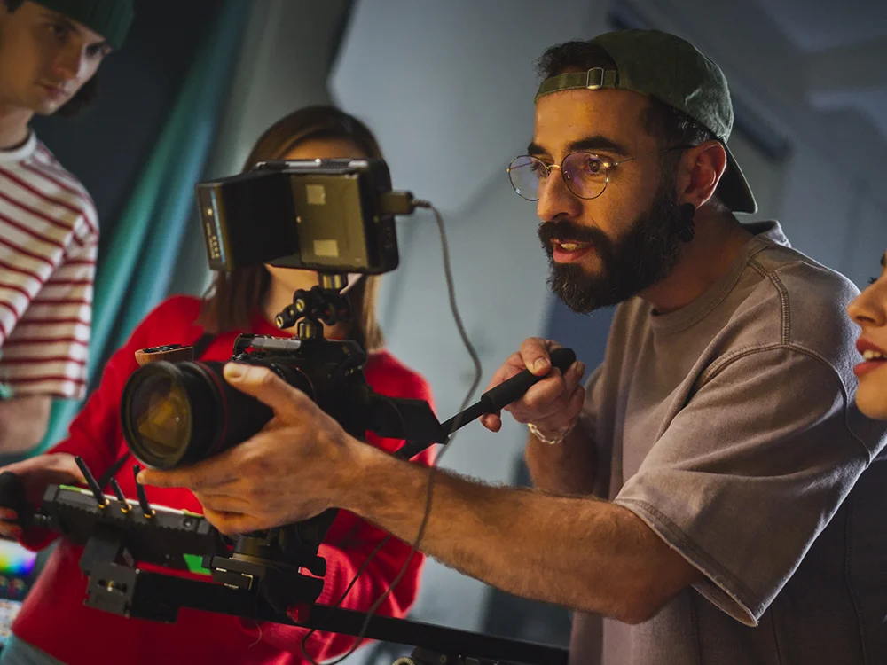 Filmmakers looking at camera kit