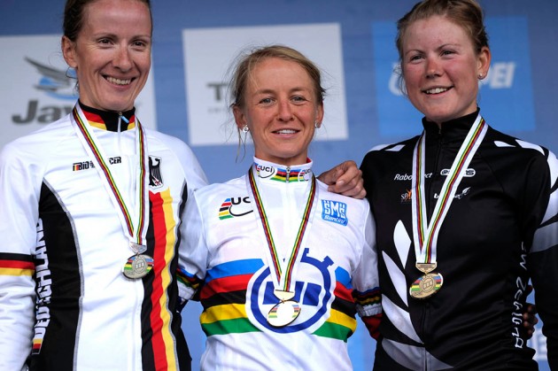 Photo: Emma Pooley (centre) became the world time trial champion for Britain in 2010. 