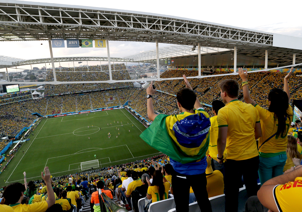 Spectators watch the first half of the World Cup opening match between Brazil and Croatia at Itaquerao Stadium in Sao Paulo.