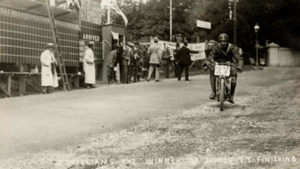 Image: E. Williams, the winner of the Junior TT, finishes at the Grandstand at St.Ninian’s, 1914